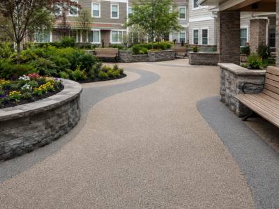 Courtyard path in tan rubber surfacing